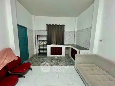 Cozy living room with modern furniture and tiled flooring