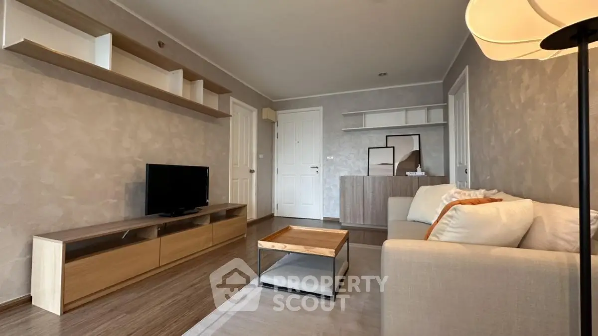 Modern living room with stylish furniture and neutral tones