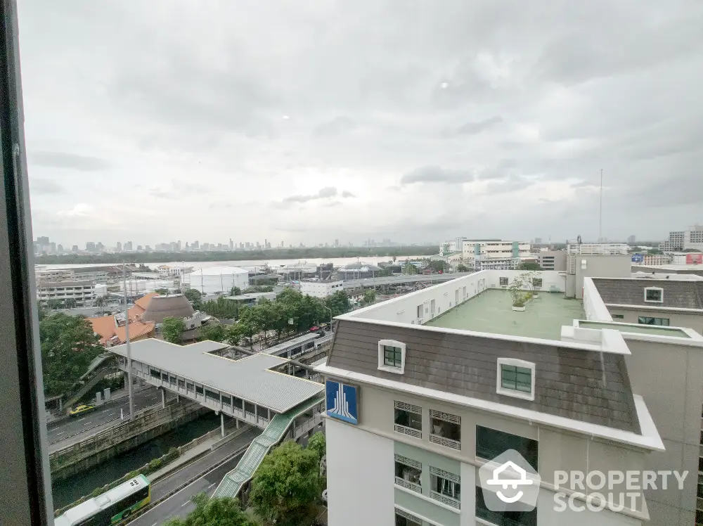 Stunning cityscape view from high-rise building with expansive skyline and urban landscape.