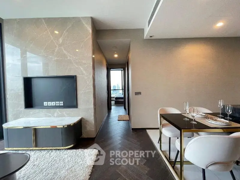 Luxurious modern living room with elegant dining area and stunning city view.