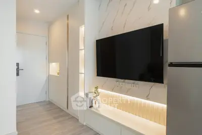 Modern living room with sleek TV setup and stylish decor