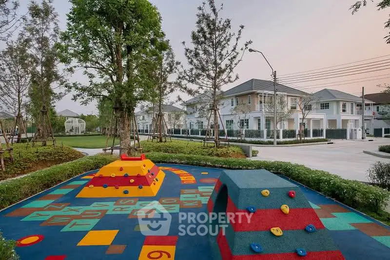 Charming residential community with modern homes and vibrant playground, perfect for families seeking a lively neighborhood.