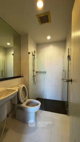 Modern bathroom with sleek design and glass shower enclosure