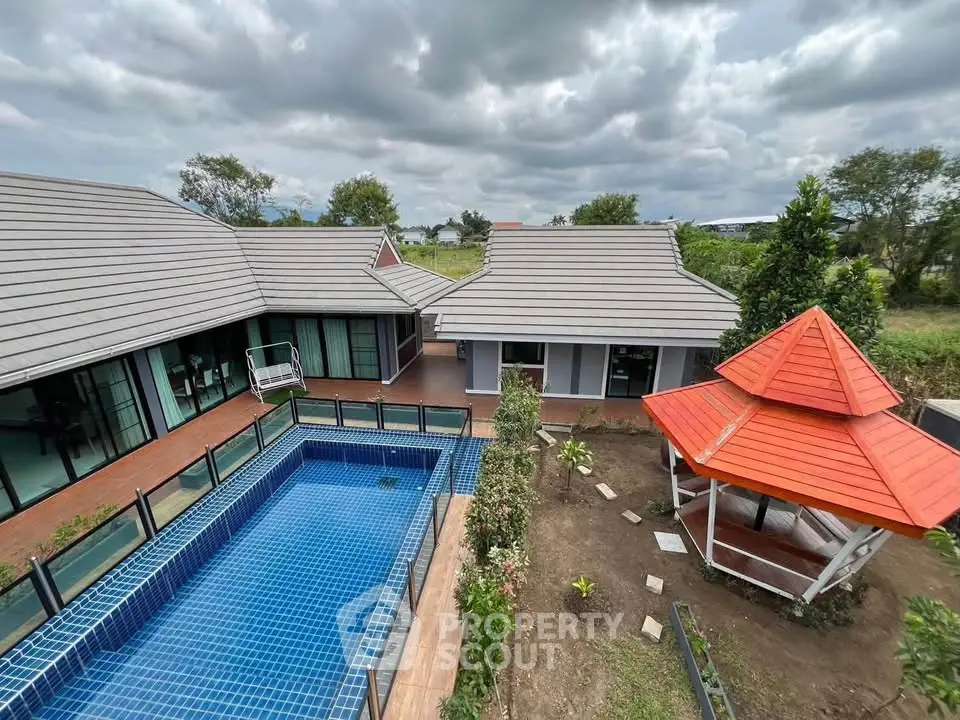 Stunning modern home with private pool and garden gazebo, perfect for luxury living.
