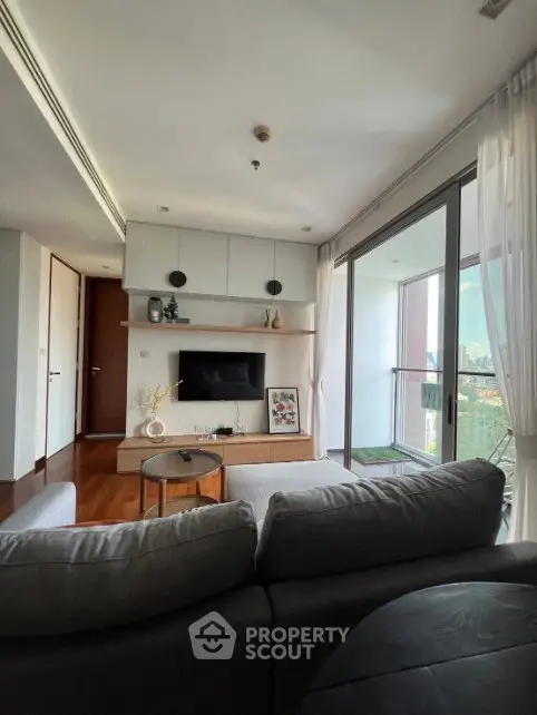 Modern living room with balcony view in a stylish apartment