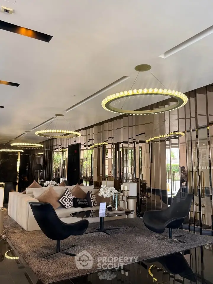 Luxurious modern lobby with elegant seating and stylish lighting fixtures