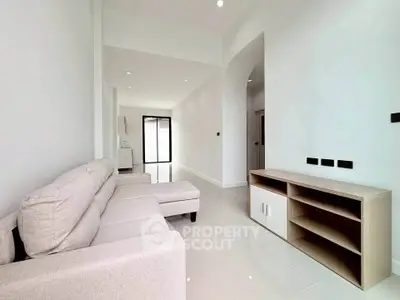 Spacious modern living room with sleek design and natural light