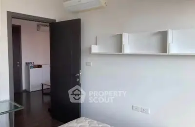 Modern bedroom with air conditioning and minimalist design in a stylish apartment.