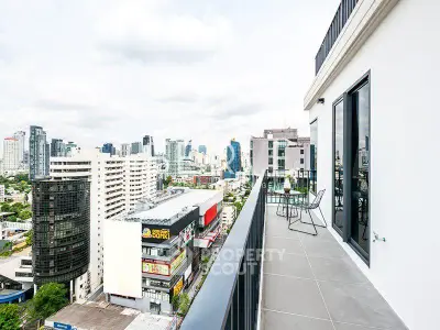 Stunning cityscape view from a modern high-rise balcony, perfect for urban living enthusiasts.