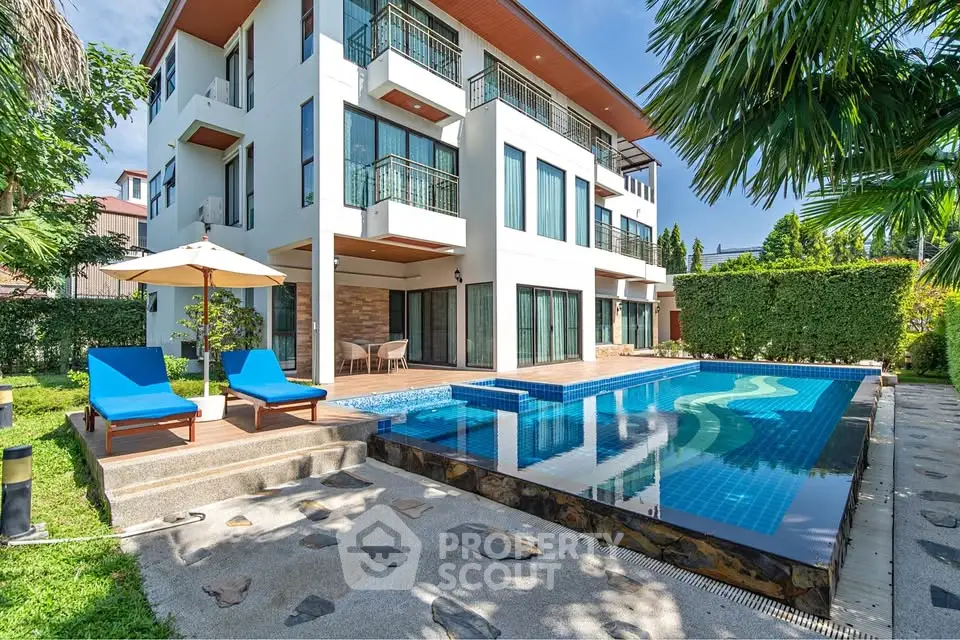 Luxurious modern villa with private pool and lush garden