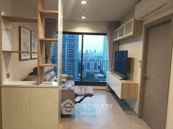 Modern living room with city view, featuring sleek furniture and large windows for natural light.