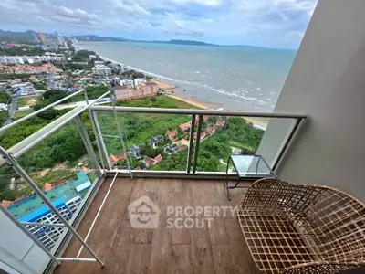 Stunning high-rise balcony with breathtaking ocean and city views, perfect for relaxation and enjoying the scenery.