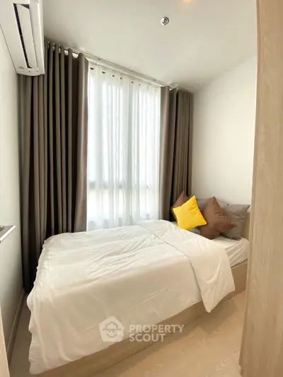 Cozy bedroom with modern decor and natural light