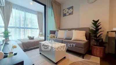 Modern living room with cozy sofa and large window view