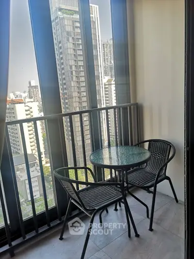 Chic urban balcony with stunning cityscape views, perfect for relaxation and enjoying the skyline.