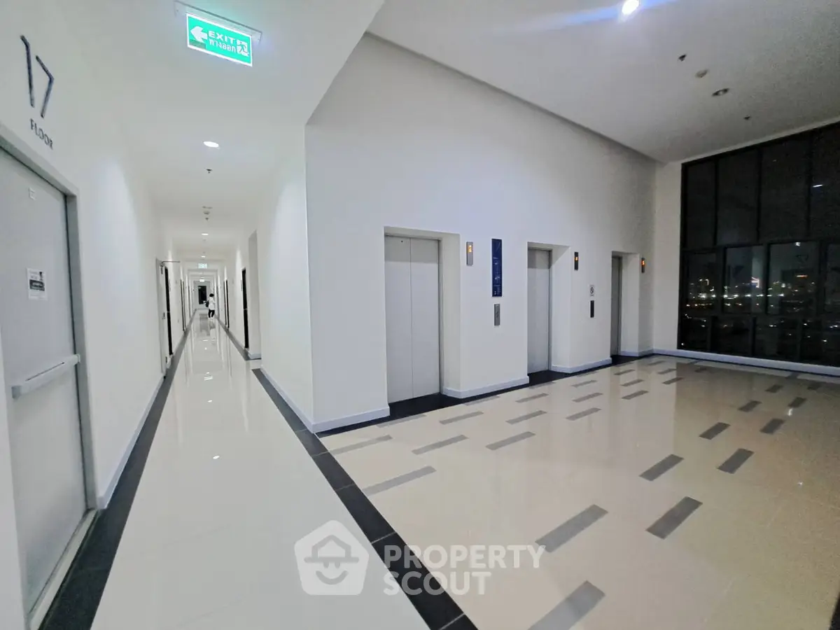 Modern building corridor with elevators and sleek design