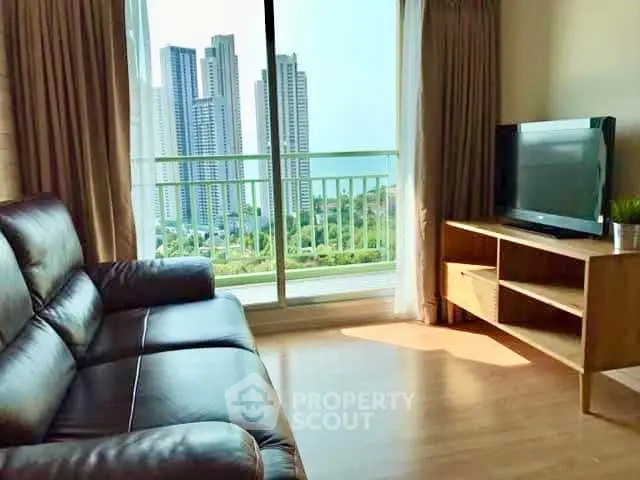 Modern living room with city view and balcony access