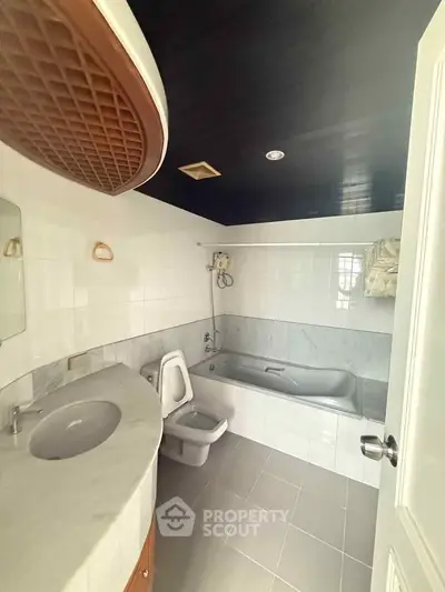 Spacious bathroom with modern fixtures and elegant design