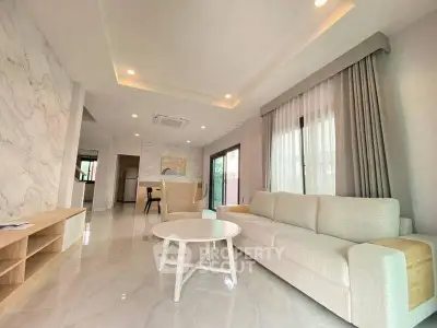 Spacious modern living room with elegant decor and natural light