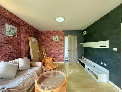 Charming living room with modern decor and cozy seating area.