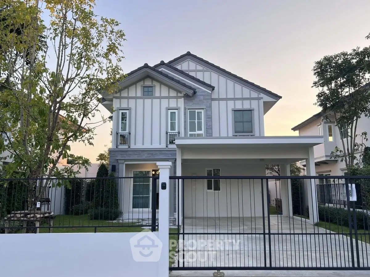 Charming two-story house with modern design and spacious driveway