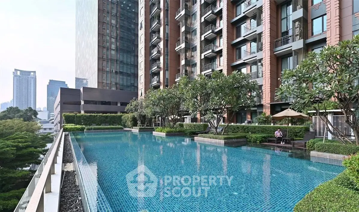 Luxurious high-rise building with stunning rooftop pool and city view