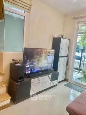 Modern living room with sleek TV setup and stylish decor