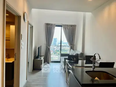 Modern open-plan living room with city view and sleek kitchen island.