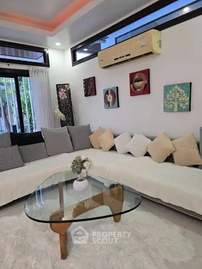 Stylish living room with modern decor and cozy seating area