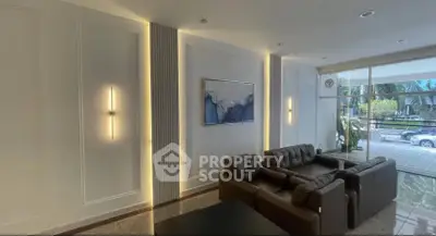 Luxurious living room with modern lighting and elegant decor