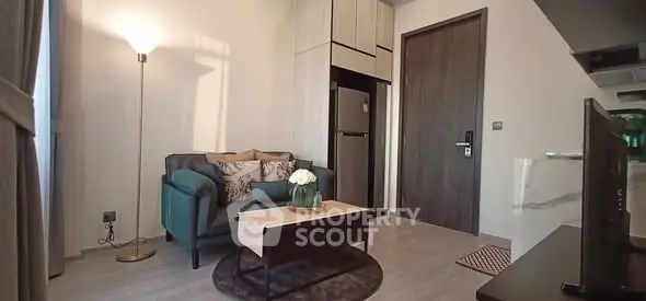 Modern living room with cozy seating and stylish decor