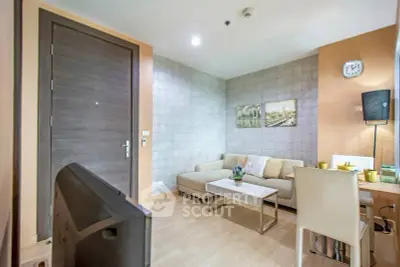 Modern living room with cozy sofa and stylish decor in a contemporary apartment.