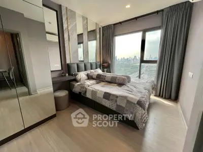 Luxurious bedroom with stunning city view and modern decor