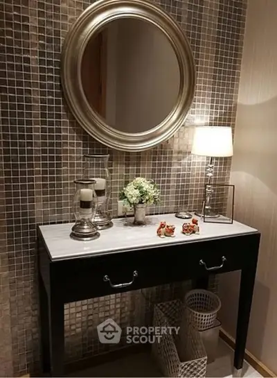 Elegant hallway with stylish console table and decorative mirror