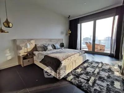 Luxurious bedroom with stunning city view and elegant decor