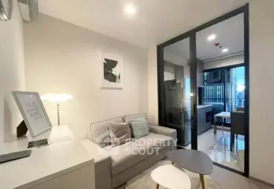 Modern living room with cozy sofa and stylish decor in a compact apartment