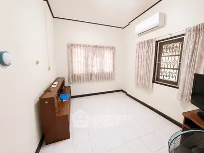 Cozy living room with air conditioning and natural light