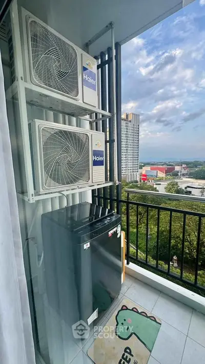 Modern balcony with air conditioning units and scenic city view, perfect for urban living.
