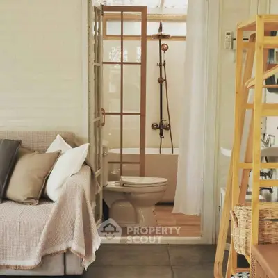 Cozy bathroom with vintage fixtures and adjacent living area, perfect for modern living.