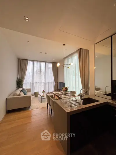 Modern open layout living room with dining area and large windows