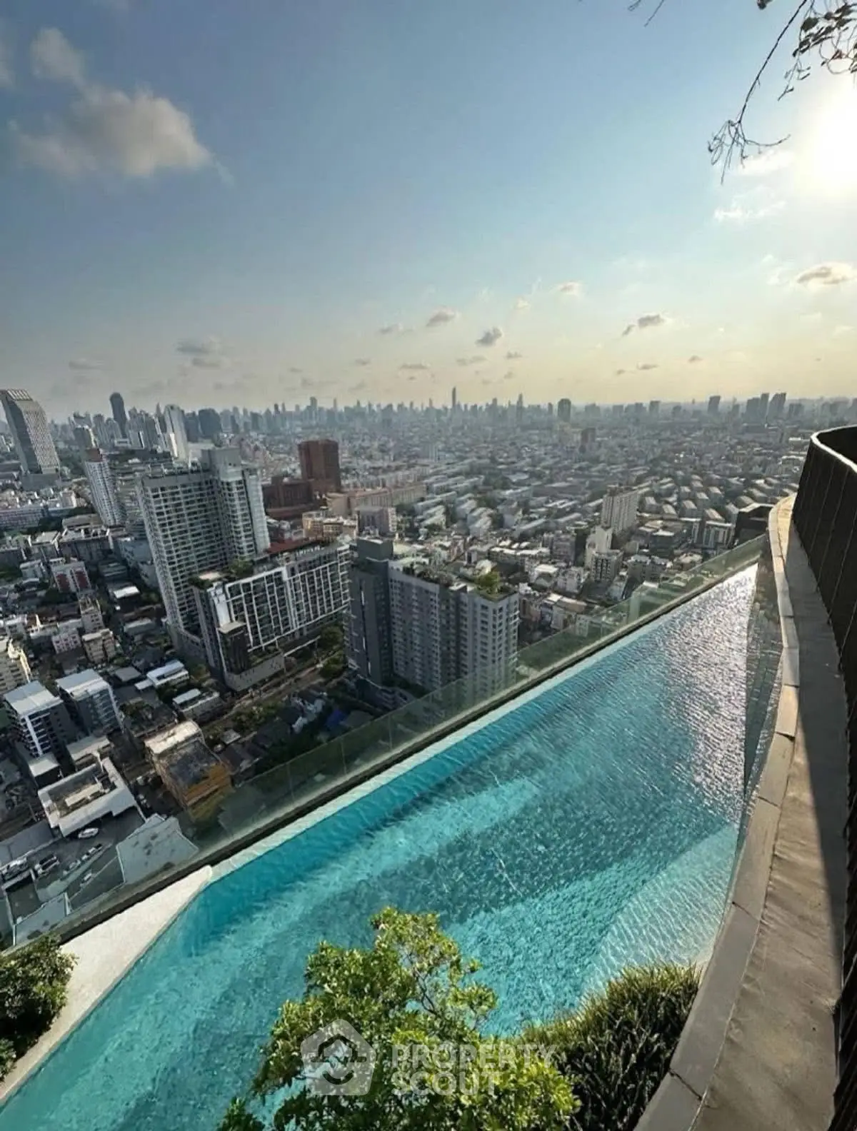Stunning rooftop infinity pool with panoramic city skyline view