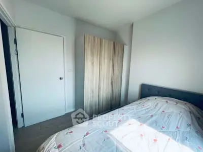Cozy bedroom with natural light and modern wardrobe