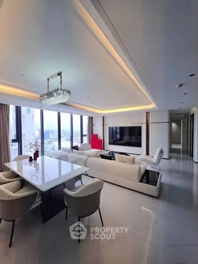 Luxurious modern living room with elegant dining area and panoramic city views.