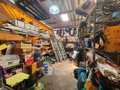 Spacious storage room filled with tools and equipment, ideal for organizing and storing various items.