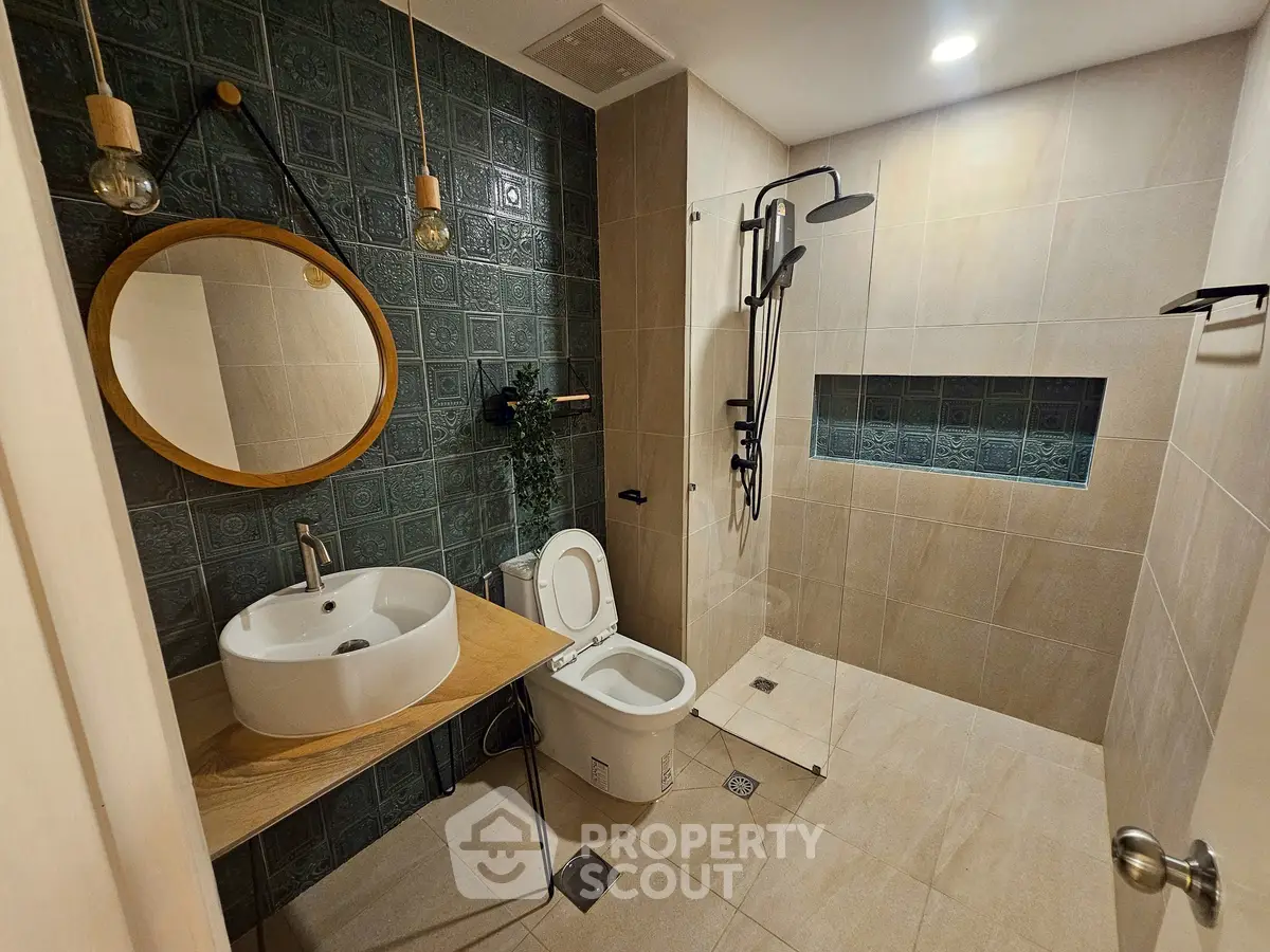 Modern bathroom with stylish fixtures and elegant tile design