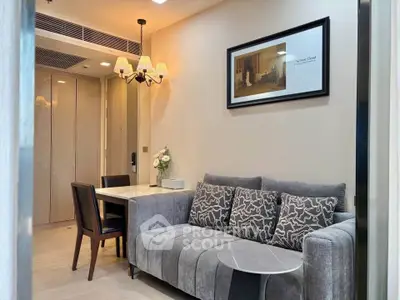 Stylish living room with modern decor and cozy seating in a contemporary apartment.
