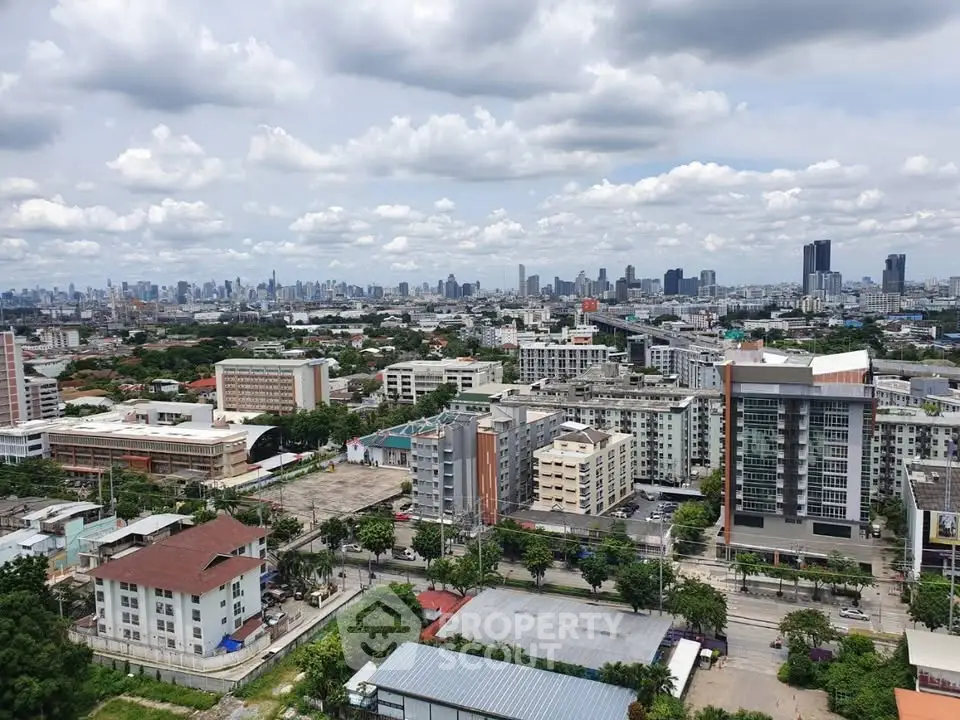 Stunning cityscape view showcasing modern urban skyline and residential buildings under a vibrant sky.