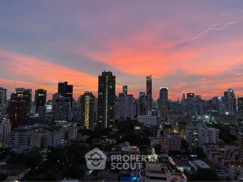 Stunning city skyline view at sunset with vibrant sky colors.