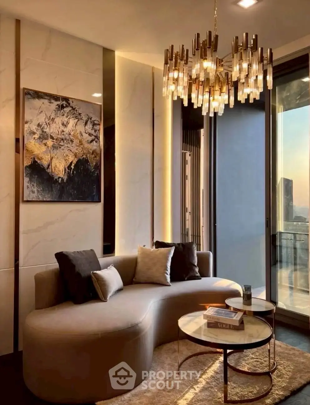 Luxurious living room with elegant chandelier and modern decor, featuring a stunning city view.