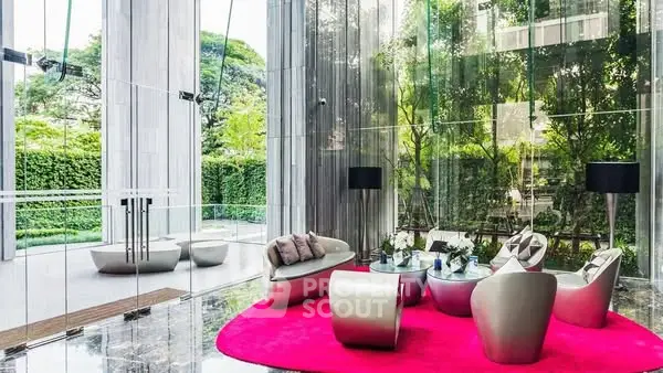 Luxurious modern lobby with sleek furniture and lush garden view